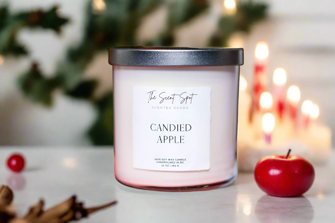 The Scent Spot Candied Apple CandleCandlePicture a soy candle that's a mix of amazing scents. When you light it up, it fills the room with the cozy smell of red apple and a hint of spicy cinnamon. As it burCandied Apple Candle