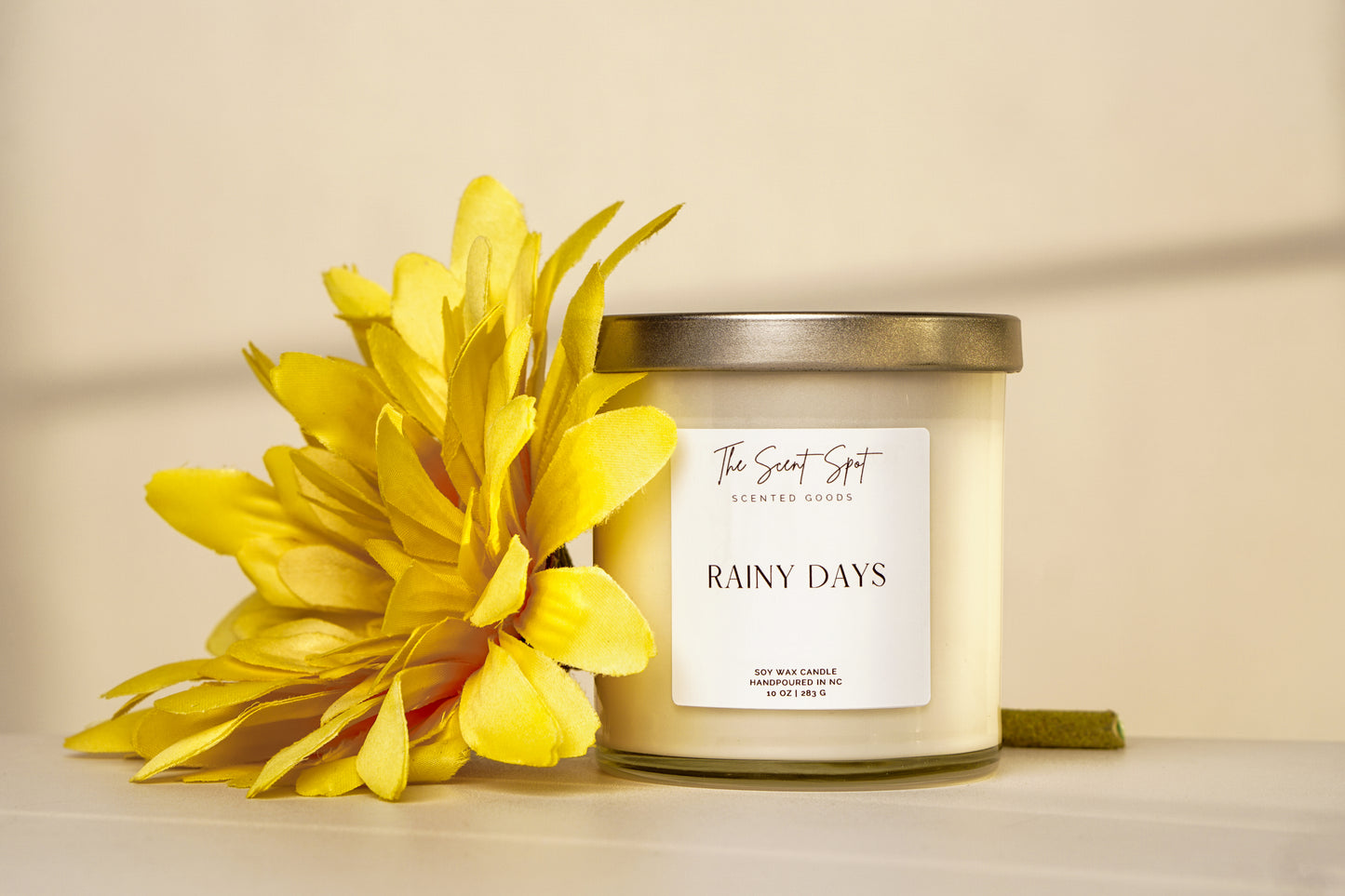 The Scent Spot Rainy Days CandleCandleThis candle combines the fresh and earthy scents of grass and ozone with the delicate and floral scent of jasmine is the perfect addition to create a calming and sooRainy Days Candle