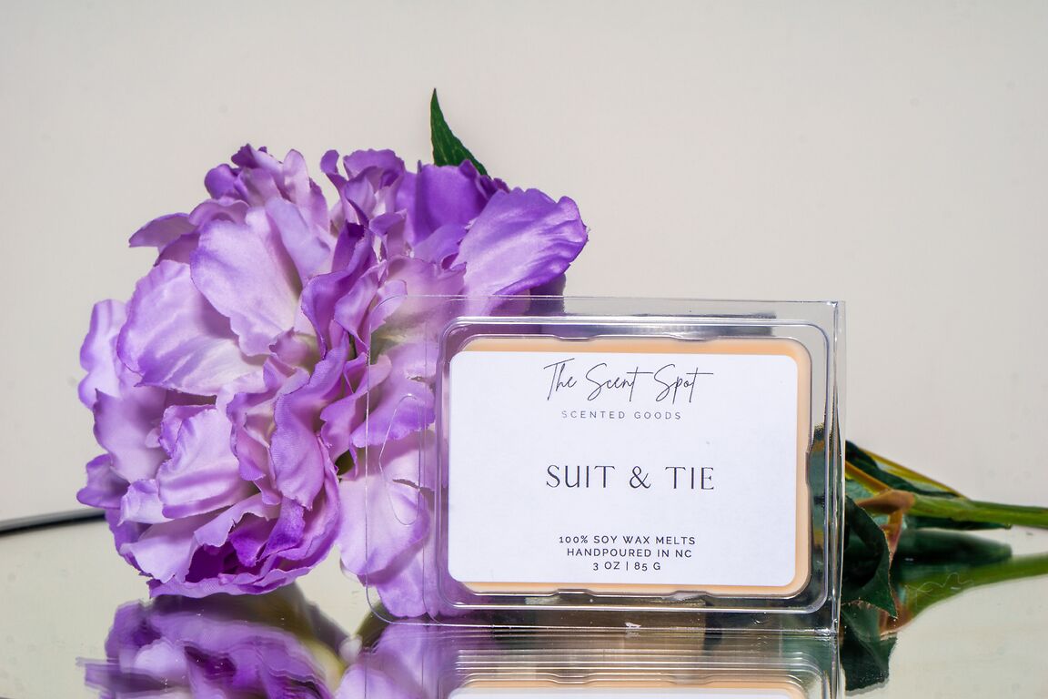 The Scent Spot Suit & Tie Wax MeltsWax MeltsIntroduce an enchanting aroma to your space with our soy wax melts. Beginning with a refreshing blend of ozone and petitgrain at the top, these melts bring a crisp aSuit & Tie Wax Melts
